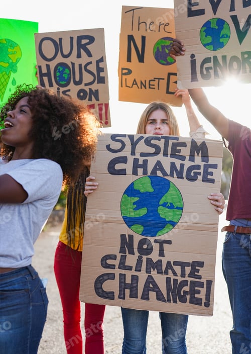 Preview: Group of multiracial people demonstrate for climate change with banner in the city