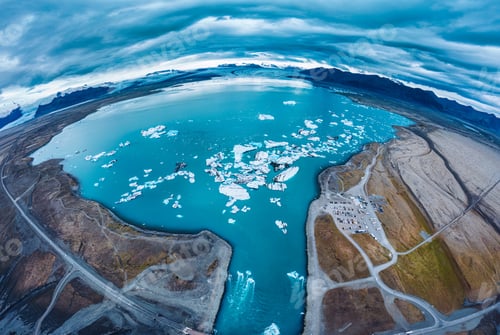 Preview: Jokulsarlon glacier lagoon with iceberg floating on gloomy day in Vatnajokull national park, Iceland