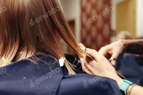 Preview: Hair salon. Close-up of little girl visits hairdresser, make fashionable hairstyle