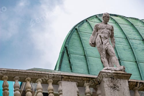 Preview: Statue at Basilica Palladiana with copper roof in Vicenza City in Italy