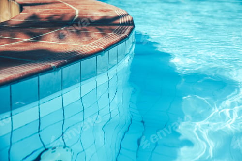 Preview: Side of the pool and transparent turquoise, clear water, nobody