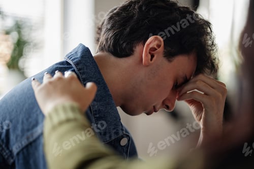 Preview: Caucasian Teenage Boy Receiving Comfort during Counseling Session