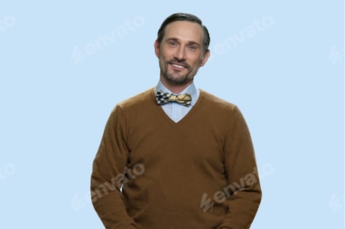 Preview: Handsome mature man looking at camera.