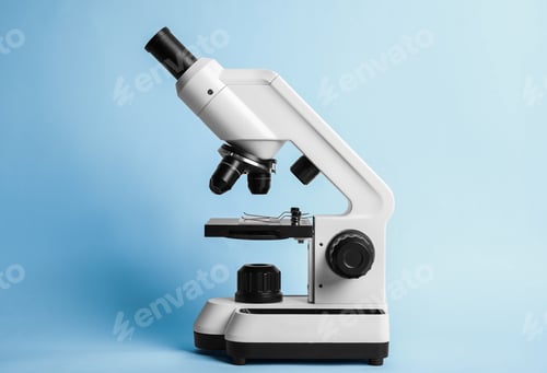 Preview: Modern microscope on blue background. Medical equipment