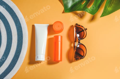 Preview: Woman's hat with sunglasses and protection cream SPF Travel Vacation Concept