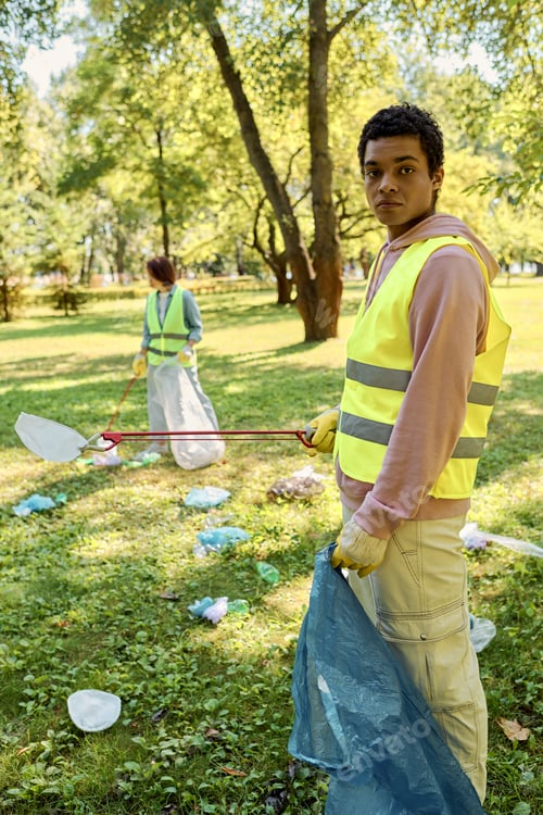 Preview: Harnessing Hope: Man in Yellow Vest With String