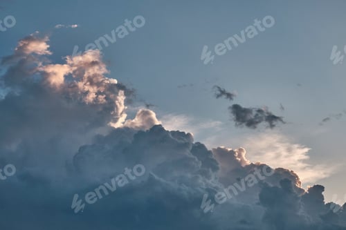 Preview: Dramatic cumulus clouds with soft sunlight as abstract background