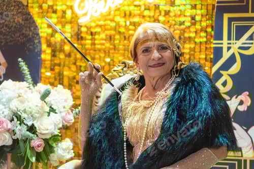 Preview: Gatsby Gala: Lady in 1920s Attire with Cigarette Holder