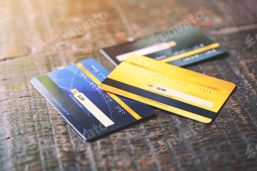 Preview: Several credit cards on wooden table