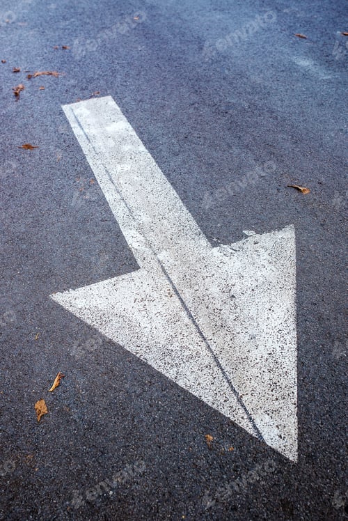 Preview: White arrow on asphalt road, traffic sign