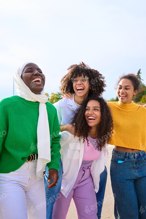 Preview: Group of diverse generation z only friends women walking piggyback having fun sunny day outdoors.