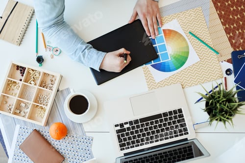 Preview: Graphic designer working with drawing tablet