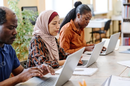 Preview: Migrants Students Using Laptops