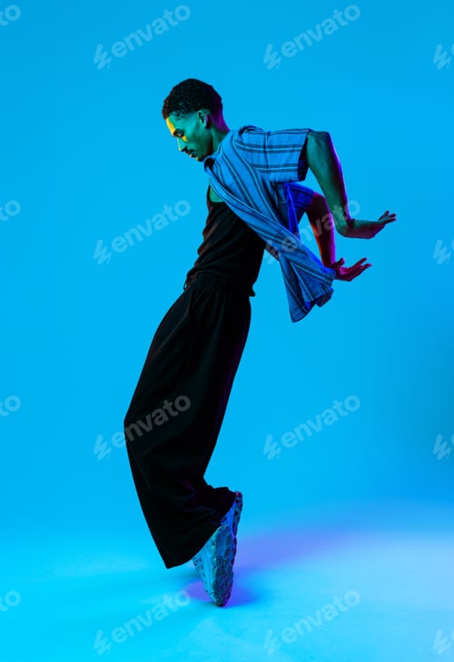 Preview: African man portrait in studio on colorful background