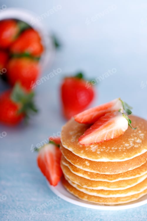 Preview: Stack of Pancakes Topped with Strawberries