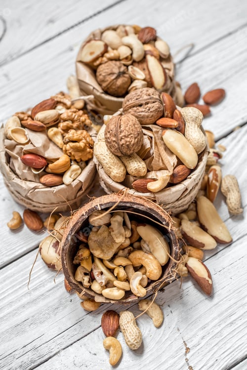 Preview: different nuts in a plate closeup