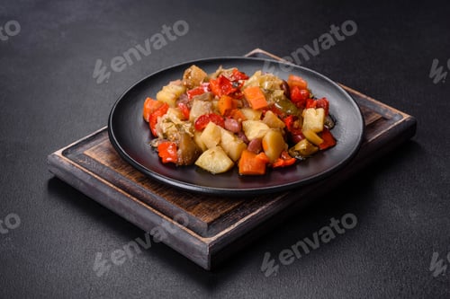 Preview: Vegetable stew or ratatouille with eggplant, tomatoes, sweet and hot peppers