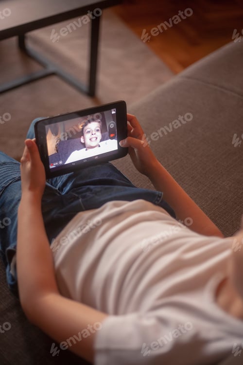 Preview: Boy Using A Tablet Device For A Selfie, Or To Record Himself For A Video.