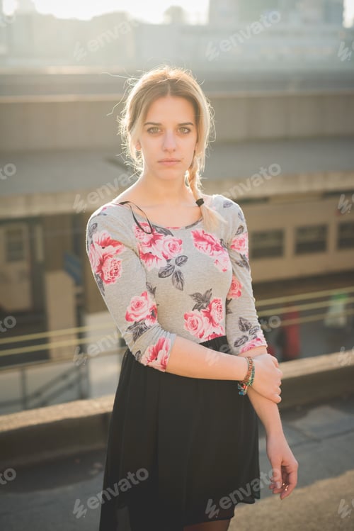 Preview: young beautiful blonde woman outdoor