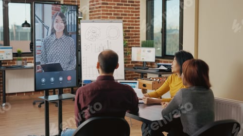 Preview: Diverse team attending business meeting on video conference