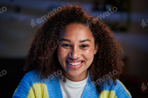 Preview: Close-up portrait of beautiful smiling young latina woman. African American girl looking at camera.