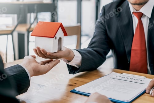 Preview: Signing a contract to buy or sell real estate.