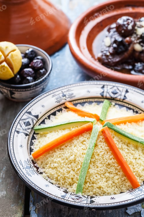Preview: Moroccan couscous topped with vegetables. Rustic style.