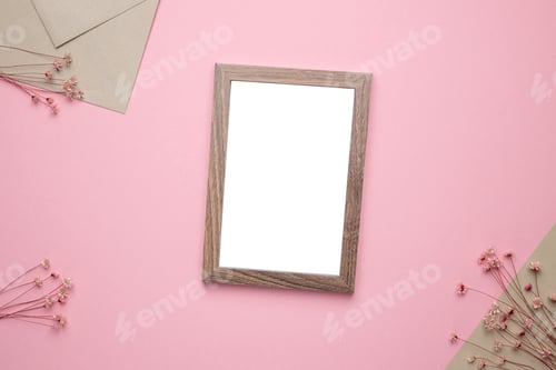 Preview: Blank Picture Frame with Flowers on Pink Background