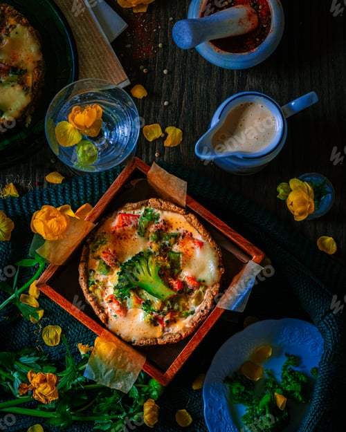 Preview: Salmon and broccolli pie served with flowers