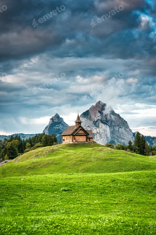 Preview: Stoos church on hill in front of Grosser Mythen mountain in summer at Schwyz, Switzerland