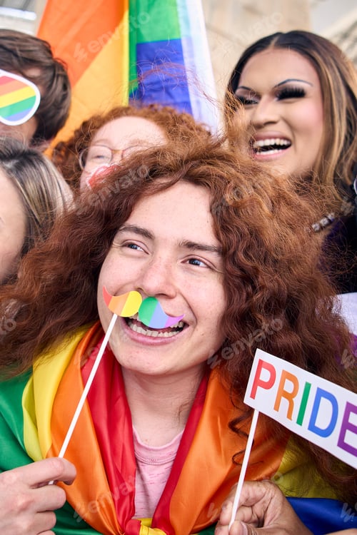 Preview: Group cheerful young friends posing fun selfie for social media celebrating gay pride day outdoors.