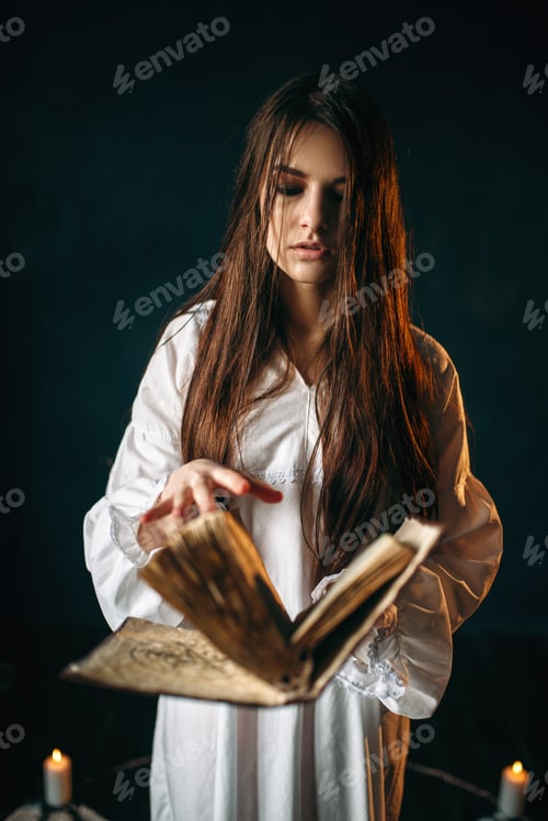 Preview: Woman sitting in the center of pentagram circle