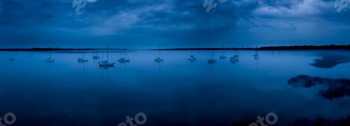 Preview: fog on glassy water with sailboats, panoramic shot.
