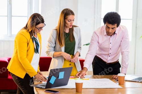Preview: Group of business people working in office.