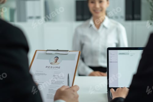 Preview: Close up of woman give resume to hr manager for job interview in office.