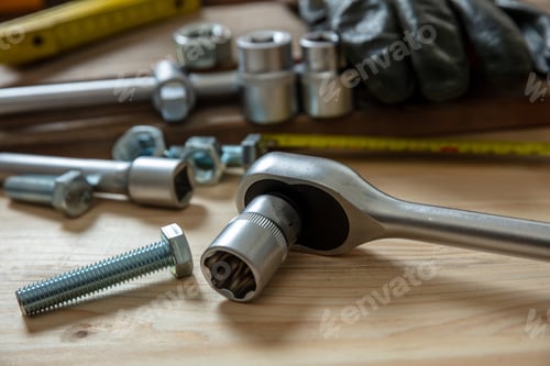 Preview: Torque wrench, work tool on wooden background. Hand tool for screw and nut tighten.