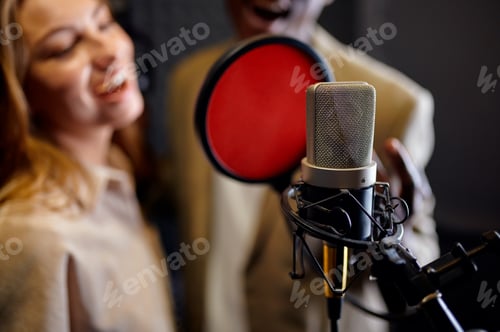 Preview: Male and female singers sings, recording studio