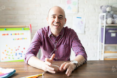 Preview: Portrait of a teacher talking through screen
