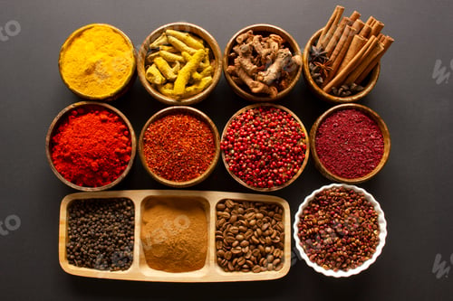 Preview: various spices on black background