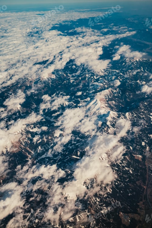 Preview: Clouds And Snow Over The Mountains From Above