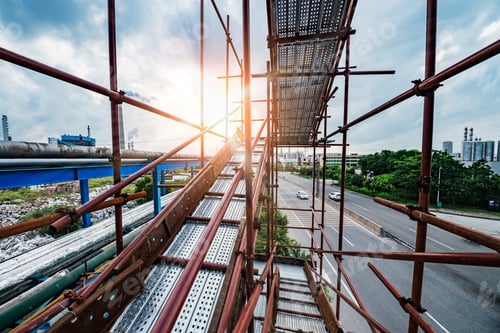 Industrial Scaffolding and Highway on a Sunny Day