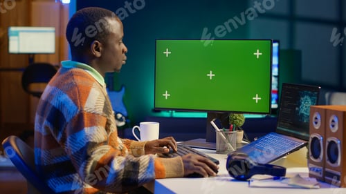 Preview: African american man using AI to develop a software system with chroma key