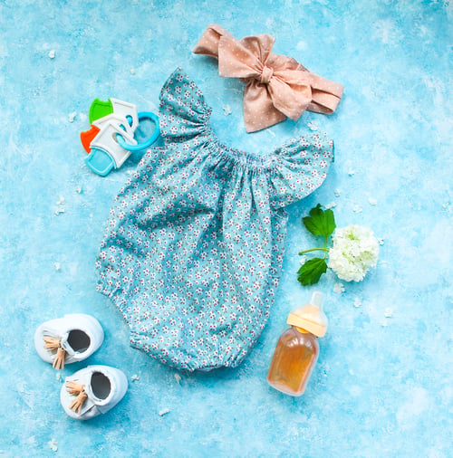 Preview: Small child accessories on turquoise background