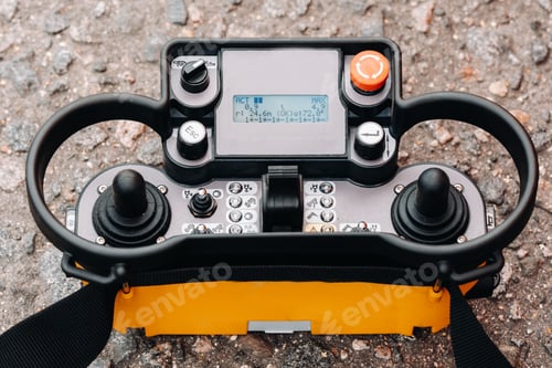 Preview: Remote control of a lifting car crane. Panel with joysticks and buttons for controlling the