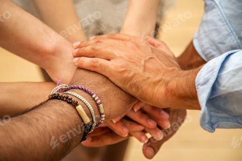 Preview: Group of hands holding together