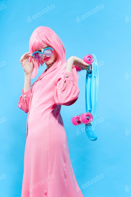 Preview: woman with skateboard in pink wig studio model unaltered