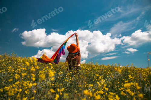 Preview: Young woman with LGBT flag.