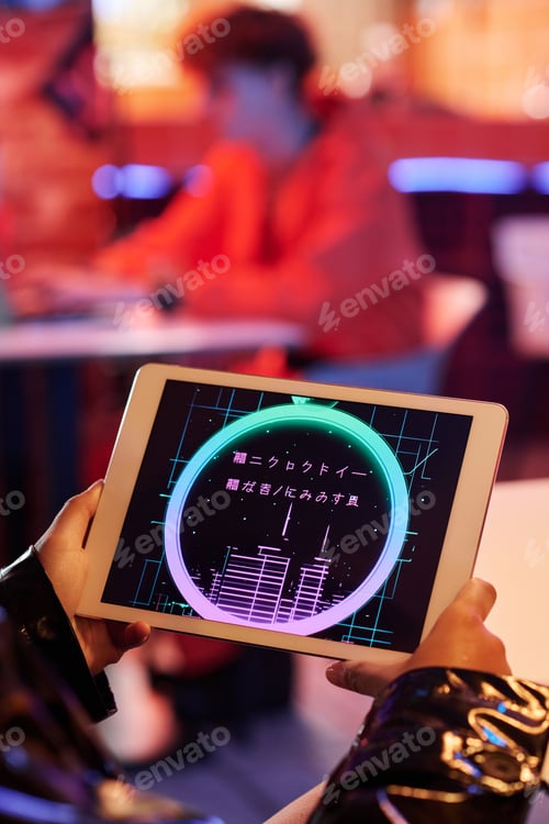 Preview: Group of hieroglyphs without meaning on screen of tablet held by cyberpunk girl