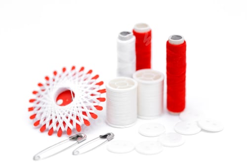 Preview: Sewing supplies on a white wooden table