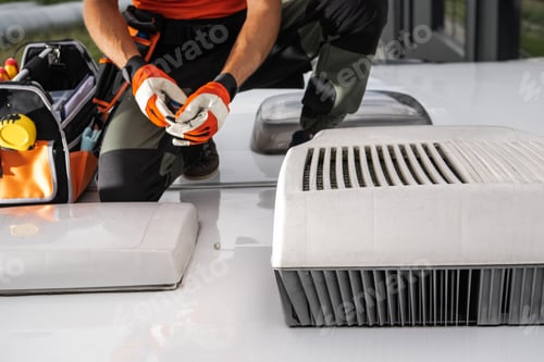 Preview: Technician Working on RV Air Conditioner
